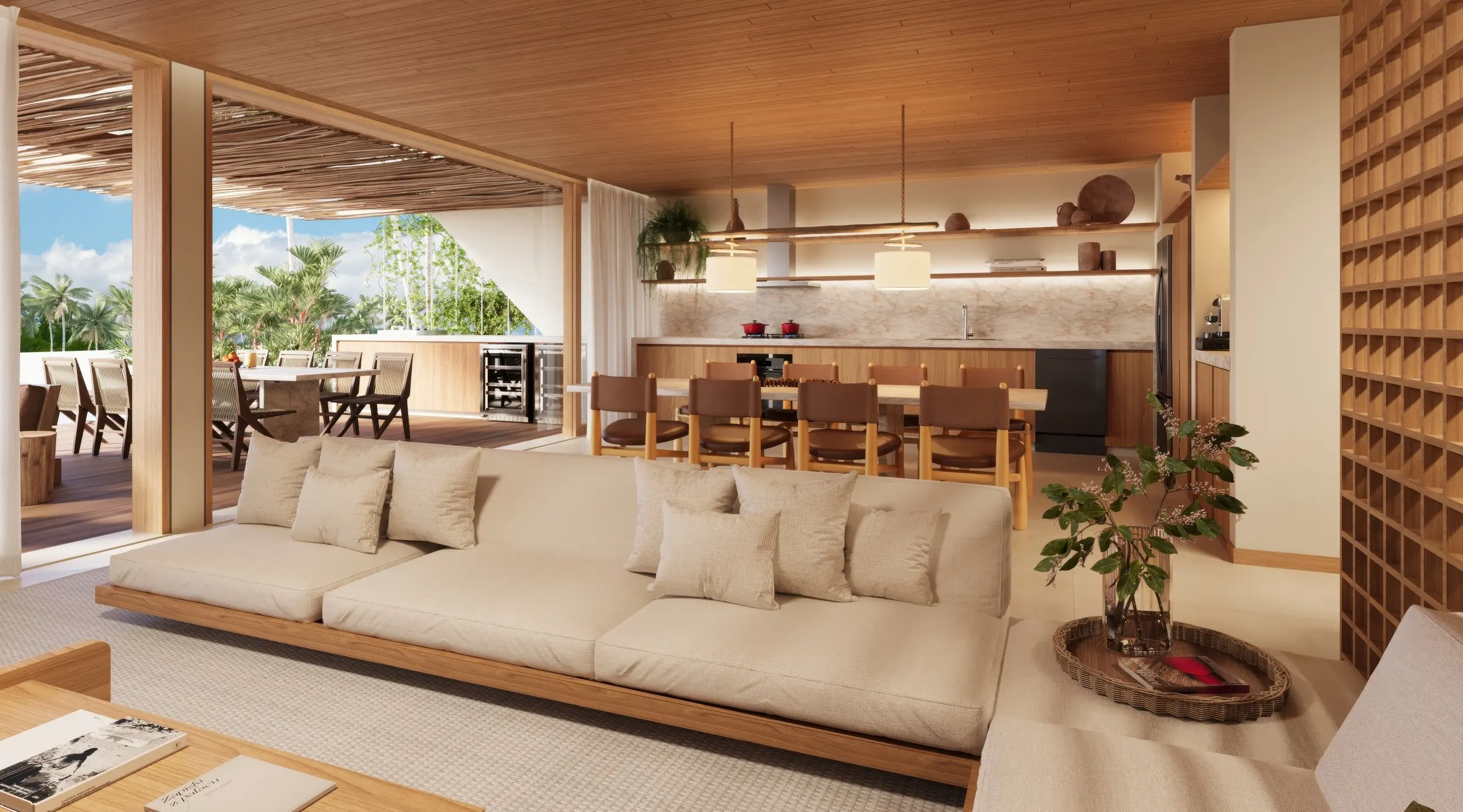 Sala integrada à cozinha, com vista para o mar